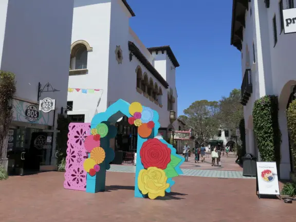 A pedestrian-only area on State Street with sidewalk cafes, good shopping, and colorful Spanish architecture.