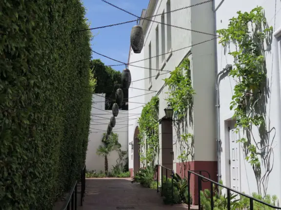 A pedestrian-only area on State Street with sidewalk cafes, good shopping, and colorful Spanish architecture.
