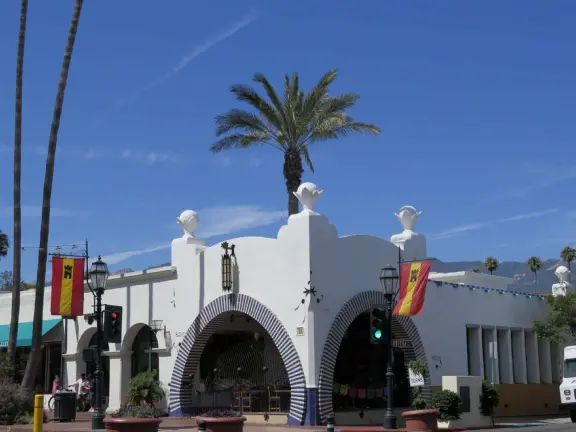 Street with beautiful historic arcades, cafes, and Spanish architecture.