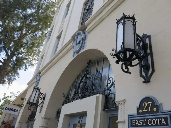 Whimsical masterpiece townhouses of vibrant colors, white-washed curves, and exquisite details, plus a Saturday farmer's market.