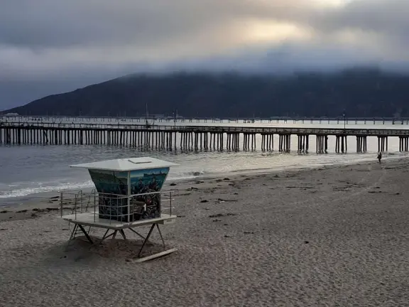 Colorful, pretty main street and boardwalk, with great cafes, lovely ship playground, and mesmerizing yellow cliffs.
