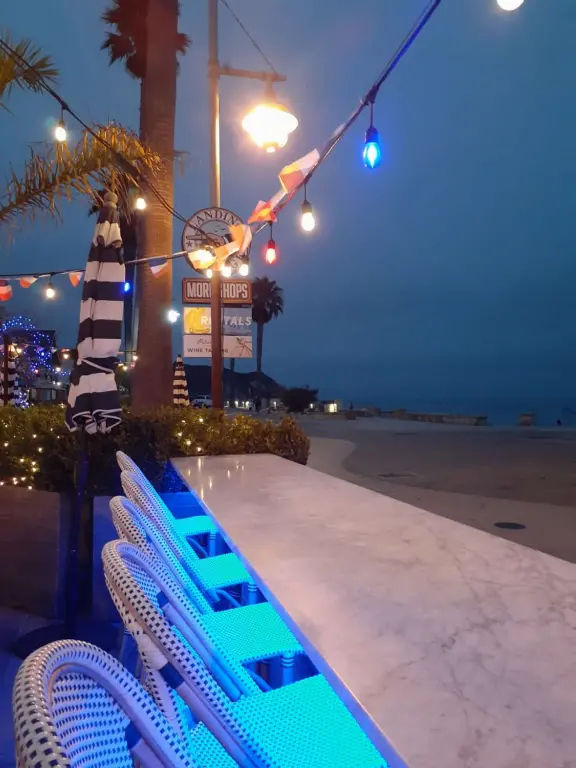 Colorful, pretty main street and boardwalk, with great cafes, lovely ship playground, and mesmerizing yellow cliffs.