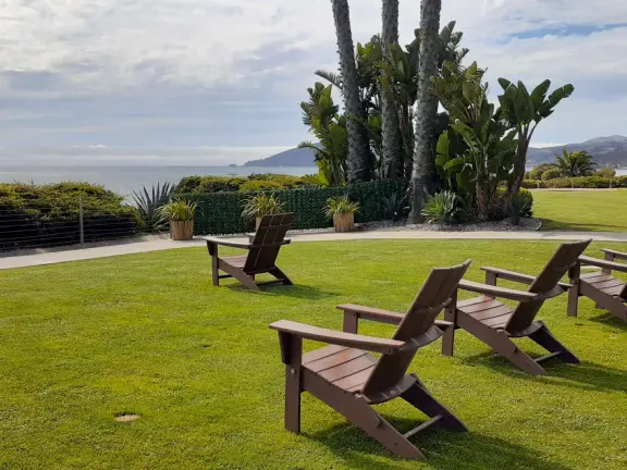Walkway on the cliffs, in front of the resorts, that's bliss at sunset and in springtime when there are flowers galore. Take stairs down to a sheltered cove with tide pools.