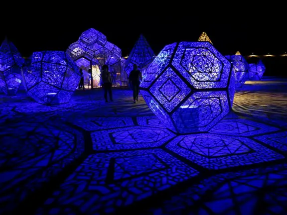 A wonderful exhibit on acres of undulating hills, with a field of lights resembling a flower field, and metal sculptures making patterns of light.