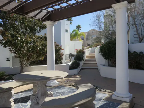 Hilltop park with basketball court with views, picnic tables, eucalyptus trees, and a difficult two-mile out-and-back trail.