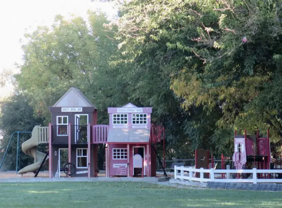 Small town with a few cafes on El Camino Real, some wineries, a sweet chapel, a playground, and pretty trees around houses along I Street.