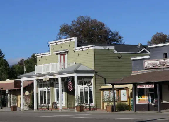 Small town with a few cafes on El Camino Real, some wineries, a sweet chapel, a playground, and pretty trees around houses along I Street.