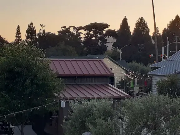Attractive public market with sunny outdoor space and cute balcony upstairs.