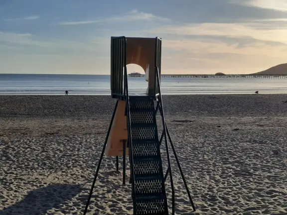 Colorful, pretty main street and boardwalk, with great cafes, lovely ship playground, and mesmerizing yellow cliffs.