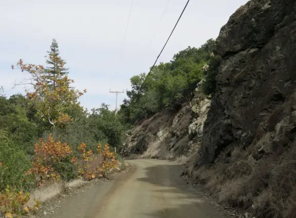 Wonderful wide open spaces with mountains of all shapes and sizes! First mile is shady. Four mile out and back, or five mile lollipop loop hike. Optional detours: architecture creations, or mountaintop swing.