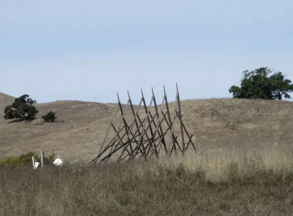 Wonderful wide open spaces with mountains of all shapes and sizes! First mile is shady. Four mile out and back, or five mile lollipop loop hike. Optional detours: architecture creations, or mountaintop swing.