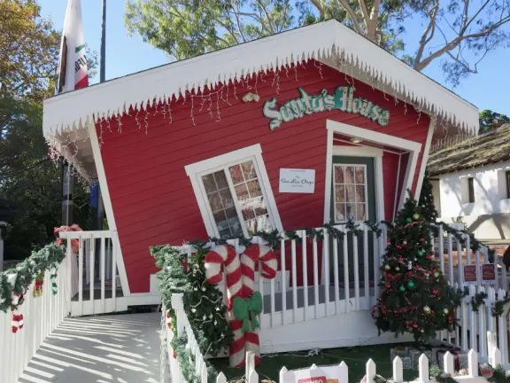 Spanish mission from late 18th century, in downtown San Luis Obispo, with giant roses in the garden behind and a lively plaza in front.