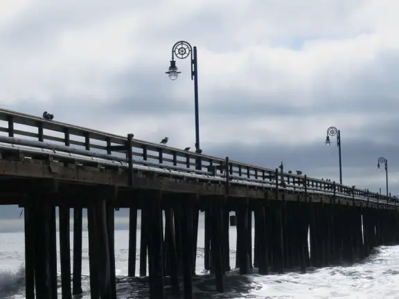 Colorful, pretty main street and boardwalk, with great cafes, lovely ship playground, and mesmerizing yellow cliffs.