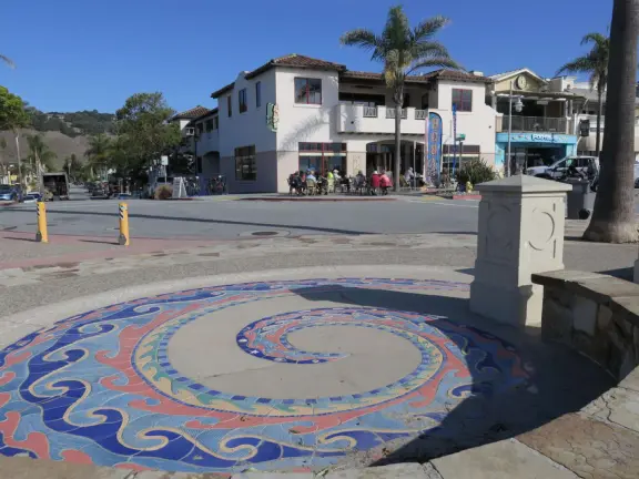 Colorful, pretty main street and boardwalk, with great cafes, lovely ship playground, and mesmerizing yellow cliffs.