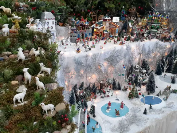 Festive beach with white cliffs, popular playground, pier, and cafe coming soon.