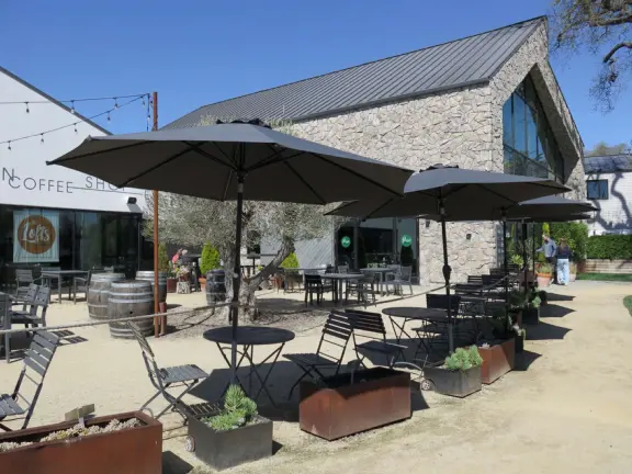 Attractive public market two minutes drive north of downtown, with outdoor and indoor seating, and nice walks nearby.