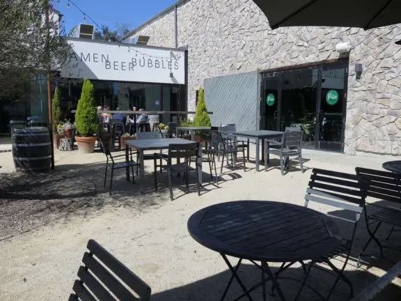 Attractive public market two minutes drive north of downtown, with outdoor and indoor seating, and nice walks nearby.