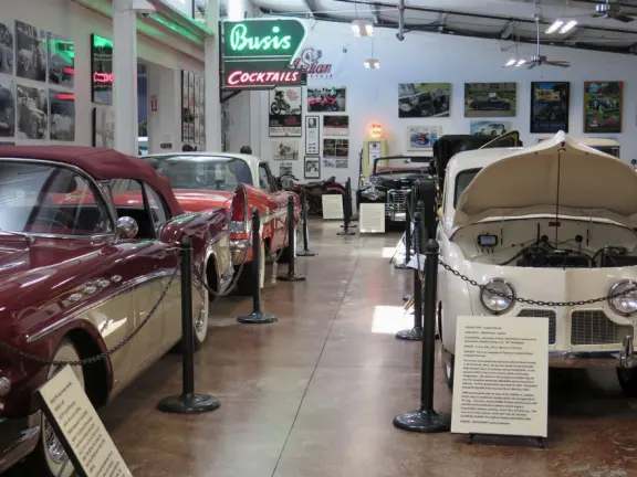 Military museum with jet fighters, World War I and II exhibits, historic and racing cars in Woodland Auto Display, bombs and missiles, communications equipment, and jeeps.