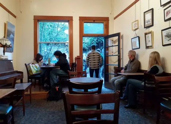 A main street of late 19th century storefronts, popular cafes, and a hip college scene.&nbsp;
