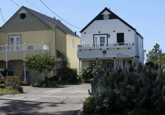 A tiny stretch of boardwalk in a beautiful setting on the estuary, with a coffee shop with a sunny patio facing the water, and cute cafes where you can relax.