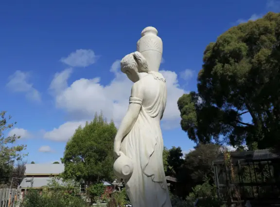 Garden in a sunny, sheltered spot, with cottage with turret under redwood trees, Buddhist gazebo, goats, and flowers galore! Seasonal pumpkins and Christmas market!