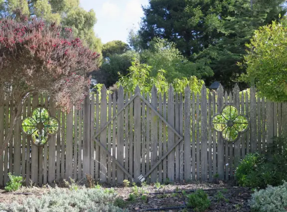 Garden in a sunny, sheltered spot, with cottage with turret under redwood trees, Buddhist gazebo, goats, and flowers galore! Seasonal pumpkins and Christmas market!