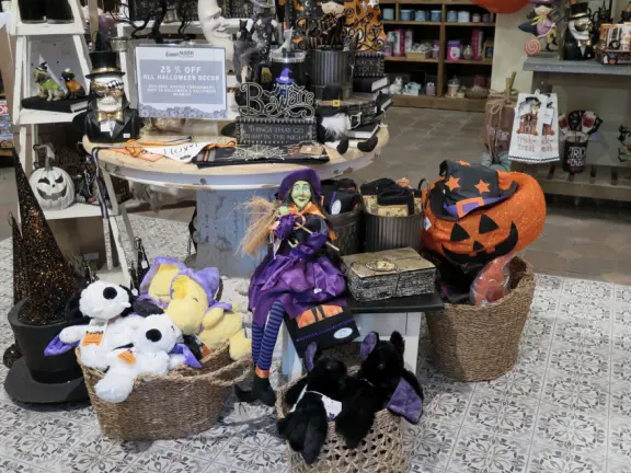 Garden in a sunny, sheltered spot, with cottage with turret under redwood trees, Buddhist gazebo, goats, and flowers galore! Seasonal pumpkins and Christmas market!