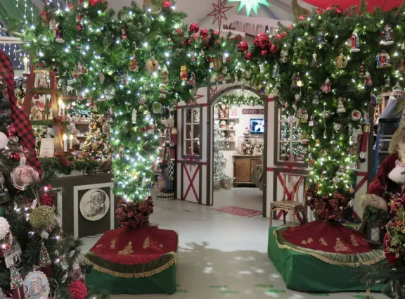Garden in a sunny, sheltered spot, with cottage with turret under redwood trees, Buddhist gazebo, goats, and flowers galore! Seasonal pumpkins and Christmas market!