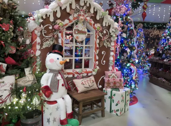 Garden in a sunny, sheltered spot, with cottage with turret under redwood trees, Buddhist gazebo, goats, and flowers galore! Seasonal pumpkins and Christmas market!