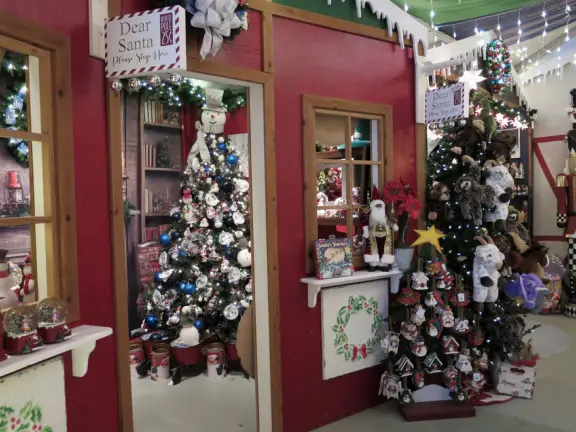 Garden in a sunny, sheltered spot, with cottage with turret under redwood trees, Buddhist gazebo, goats, and flowers galore! Seasonal pumpkins and Christmas market!