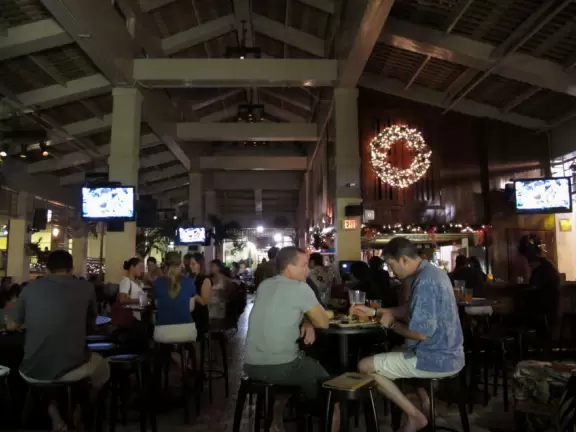 Luxurious outdoor mall with romantic third level restaurant area overlooking Ala Wai Yacht Harbor.