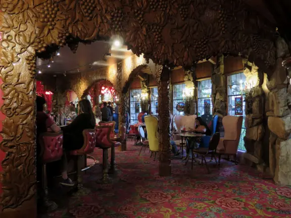 Walk the secret garden, plus admire the ranunculus flowers at the Madonna Inn entrance door in springtime, or swing, line, and ballroom dance on the fancy dance floor to live music most nights!