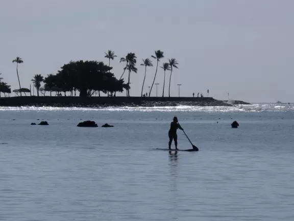 Calm beach that's great for kids and for early morning laps. Views of Waikiki skyline from the water.