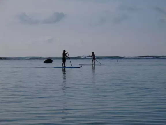 Calm beach that's great for kids and for early morning laps. Views of Waikiki skyline from the water.