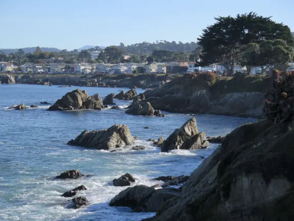 Stunning clifftop walk with new views around every corner! Hard-packed dirt 1.2 mile walking path from John Denver Beach to Lovers Point Park Beach.