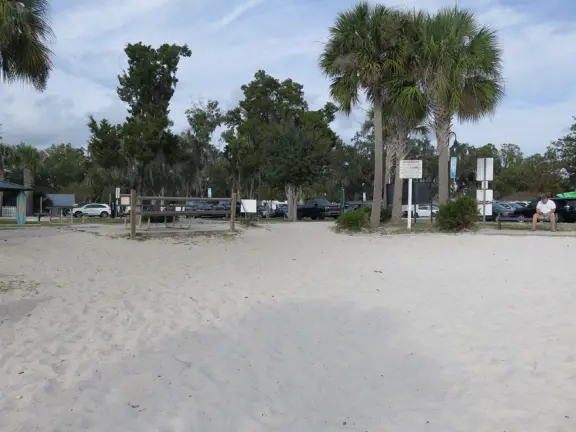 White sand beach on the canals of Crystal River, with a roped swimming section that is wonderful for a dip!