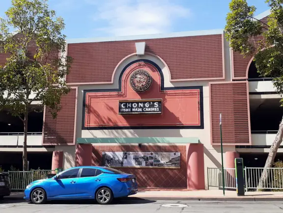 Spanish mission from late 18th century, in downtown San Luis Obispo, with giant roses in the garden behind and a lively plaza in front.