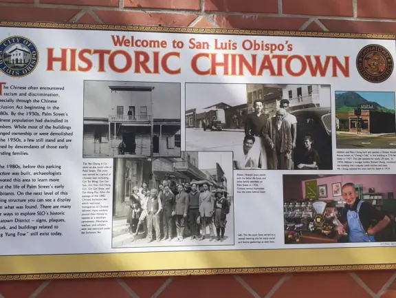 Spanish mission from late 18th century, in downtown San Luis Obispo, with giant roses in the garden behind and a lively plaza in front.