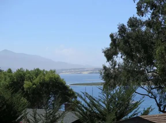 Views from above the estuary, of the sailboats and blue blue water.