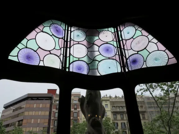Extremely crowded tour of mansion renovated by Gaudi, on the elegant Passeig de Gracia street.