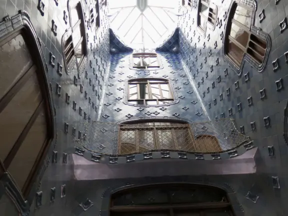 Extremely crowded tour of mansion renovated by Gaudi, on the elegant Passeig de Gracia street.