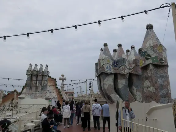 Extremely crowded tour of mansion renovated by Gaudi, on the elegant Passeig de Gracia street.