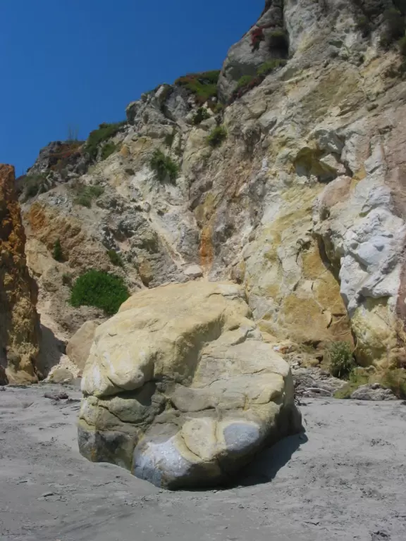 Colorful, pretty main street and boardwalk, with great cafes, lovely ship playground, and mesmerizing yellow cliffs.