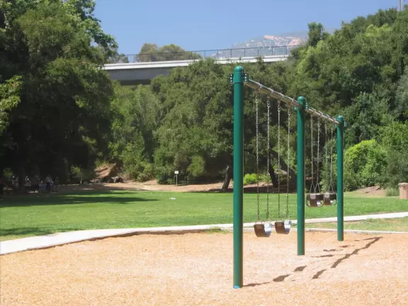 A small park tucked into a canyon in the back of a beautiful neighborhood.
