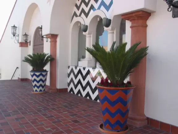 A pedestrian-only area on State Street with sidewalk cafes, good shopping, and colorful Spanish architecture.
