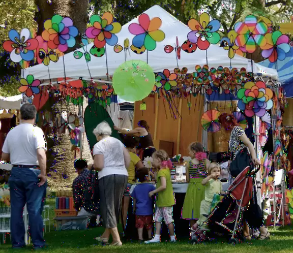 An oasis of wide green lawns, tall palms, and plump pines in the middle of the city.
