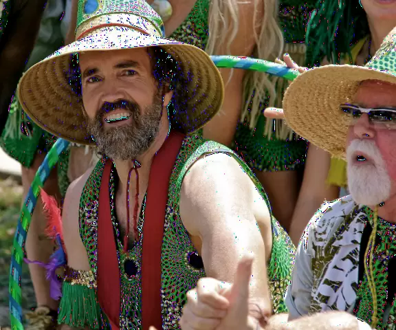 An oasis of wide green lawns, tall palms, and plump pines in the middle of the city.