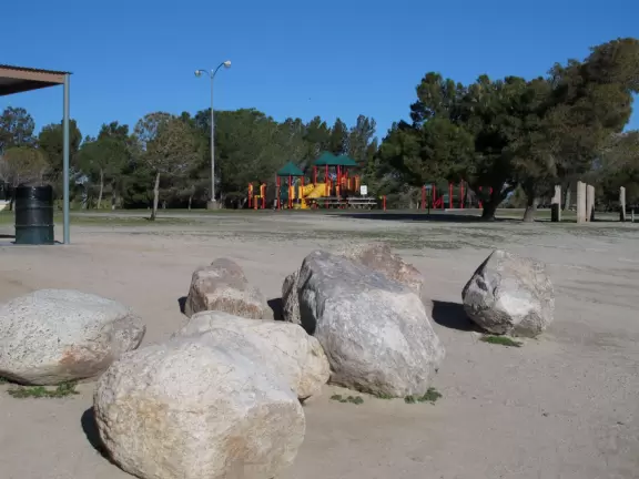 Peaceful lake with dock. Ducks and fishing, and a playground.