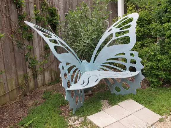 Botanical garden on top of a hill with views all around, cactus garden, colorful wildflowers, and imaginative kid's garden.