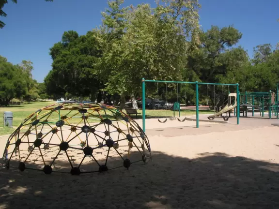 A popular playground for little kids, with shady picnic areas. Nearby at a Greek Church, pretend you're on an island in Greece...
